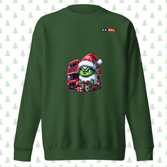 Front view of forest green Christmas sweater with a Grinch-like sheep and London bus design