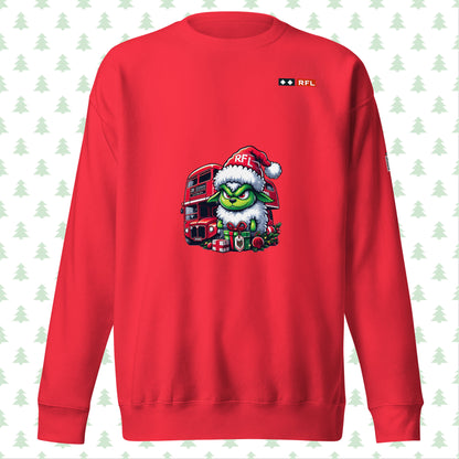 Front view of red Christmas sweater with a Grinch-like sheep and London bus design.